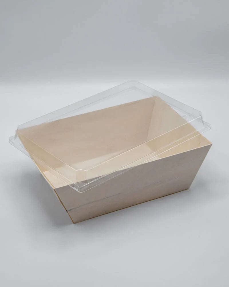 Clear plastic lid on a food box on a white background
