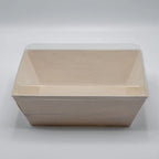 Compostable tray with lid on a gray background