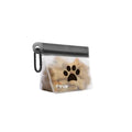 Clear pet treat bag with a black paw print logo on a white background