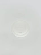 White 4 oz hot cup lid on a light gray background