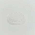 Plain white disposable lid on a light gray background