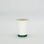 White compostable cup on a light gray background