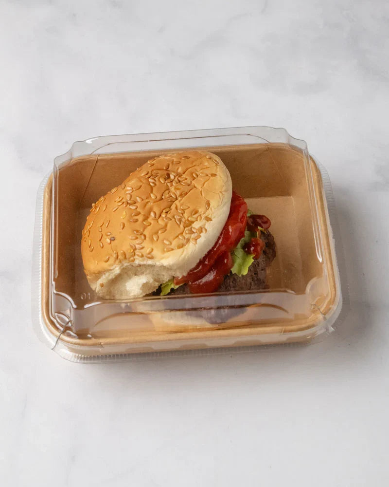 Burger in a food takeout box on a white background