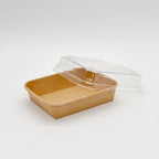 Brown paper food tray with a clear lid on a white background