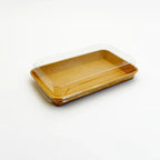 Compostable tray with a clear lid on a white background