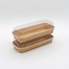 Two food trays with clear lids on a white background