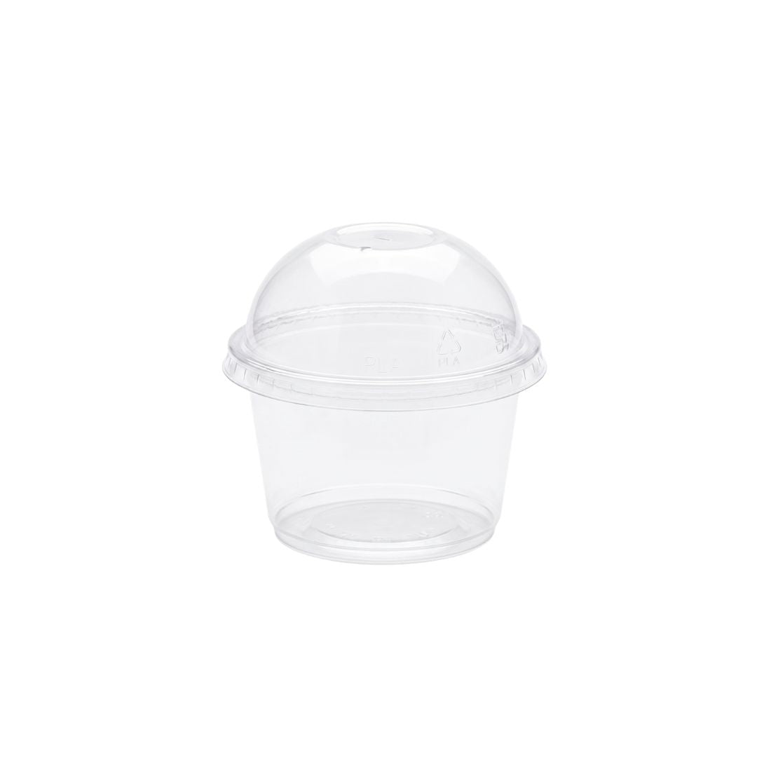 A clear portion cup with dome lid, on a white background.