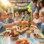 Children at a birthday party with fruit skewers that are compostable and colorful decorations.
