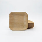 Stack of wood plates on a white background.