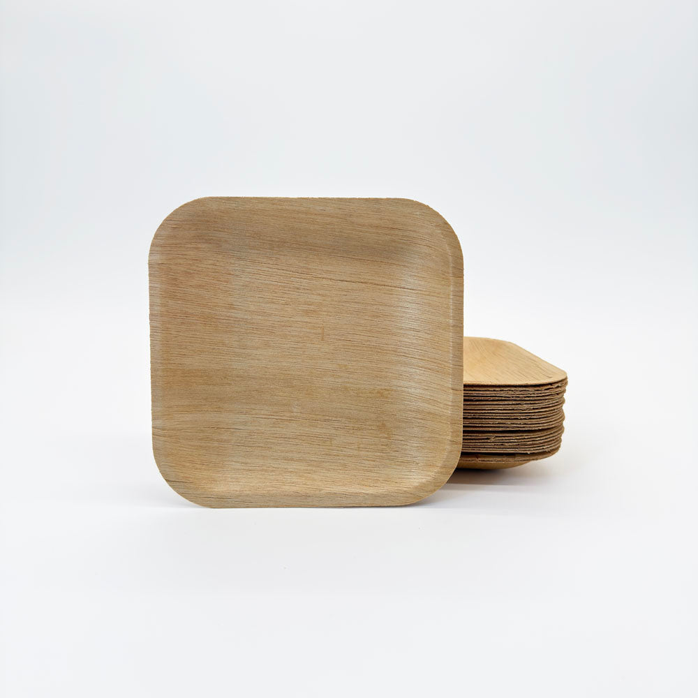 Stack of wood plates on a white background.