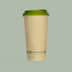 Compostable coffee cup with green lid on a light gray background